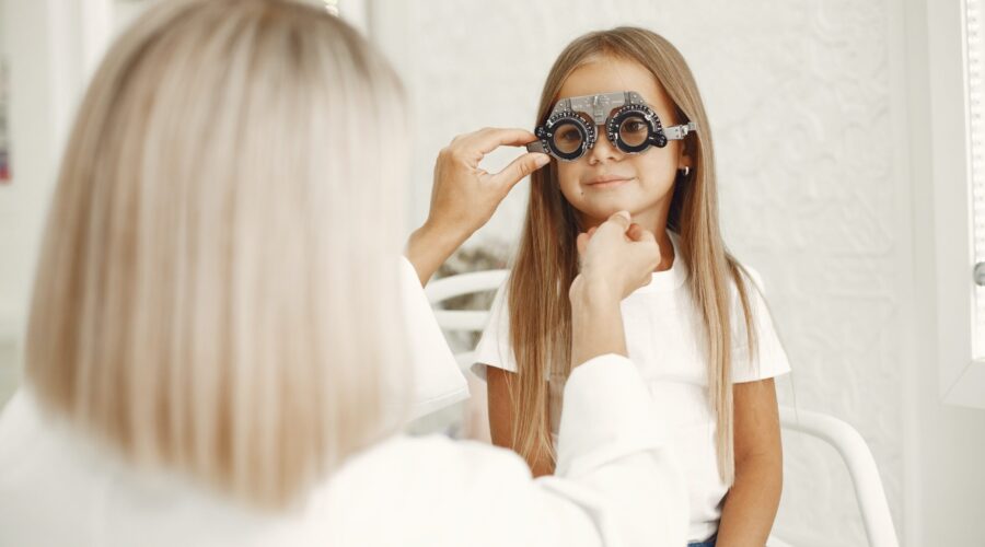 Kids' eye doctor conducting an exam
